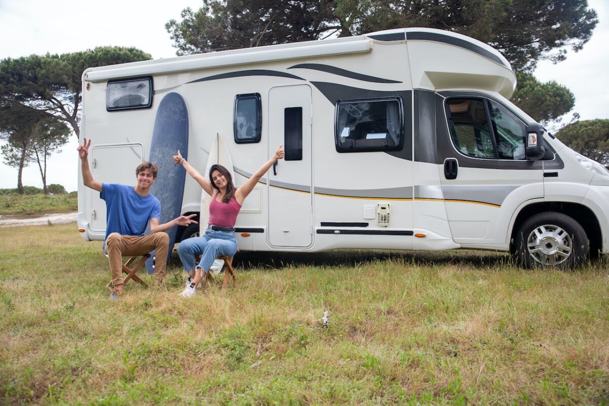 couple-sitting-outside-the-rv