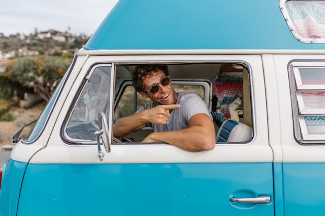 man-in-sunglasses-sitting-in-a-motorhome